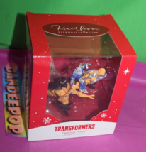 Carlton Heirloom Transformers Optimus Prime On Dinosaur 051F Holiday Ornament - £19.46 GBP