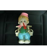 WATER CARRYING FIGURINE PIGGY BANK - $27.11 CAD