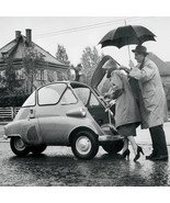 Photo Vintage of A couple gets into their BMW Isetta - $6.88+