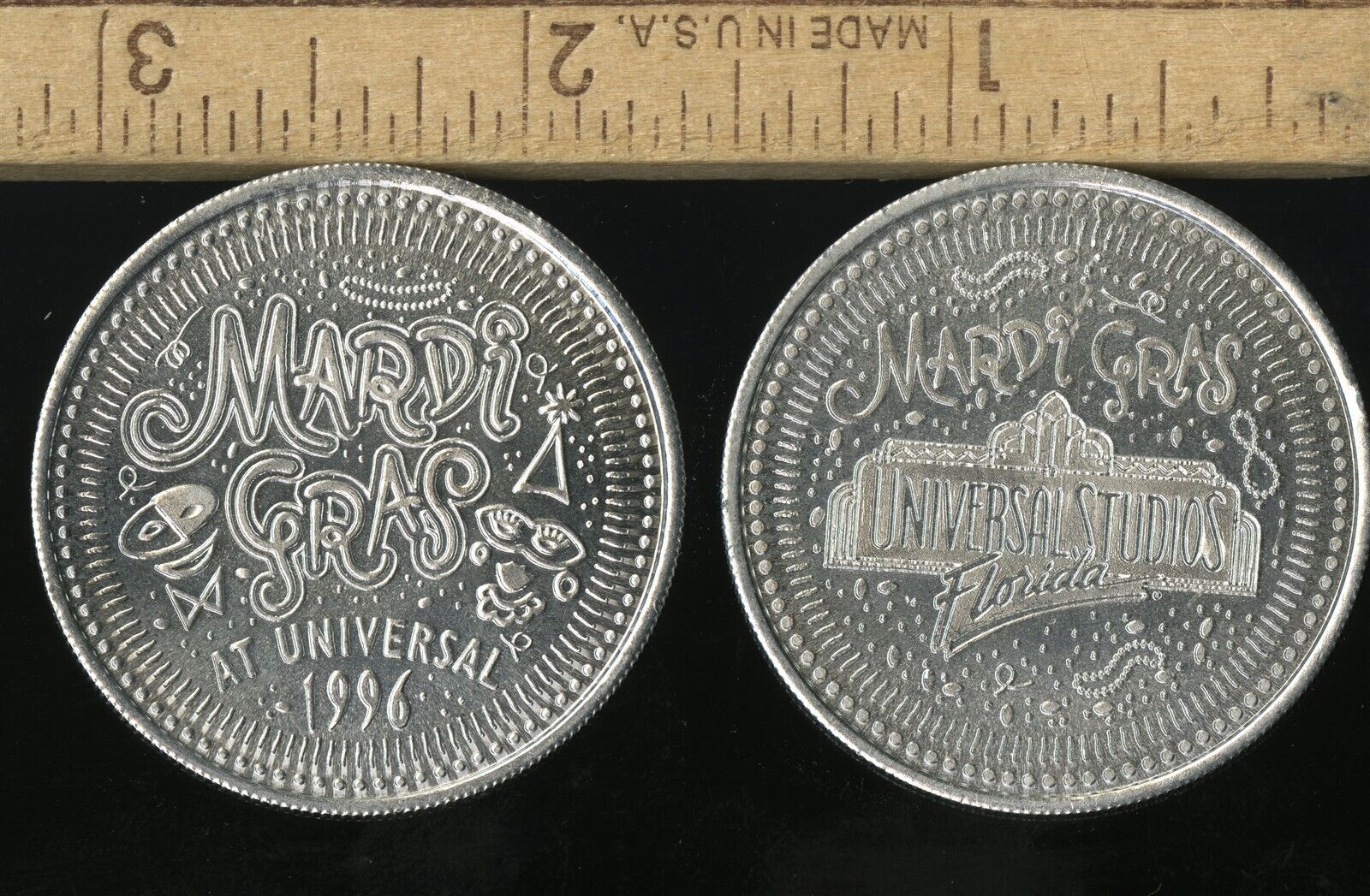 TWO UNIVERSAL STUDIOS FLORIDA 1996 MARDI GRAS ALUMINUM COIN MEDALLIONS - $4.95