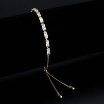 3W1662 - Gold Brass Bracelet with AAA Grade CZ in Clear - $504.89 MXN