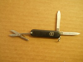 A lot of 4 Victorinox Classic SD Swiss Army knife in black  - appear unused - £15.50 GBP