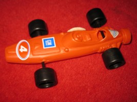 1960's Balloon Propelled Red Racecar - w/ stickers, Volvo - Elephant Emblem - $20.00