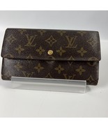LOUIS VUITTON Porte Tresor International Monogram Canvas - $2,059.18 MXN