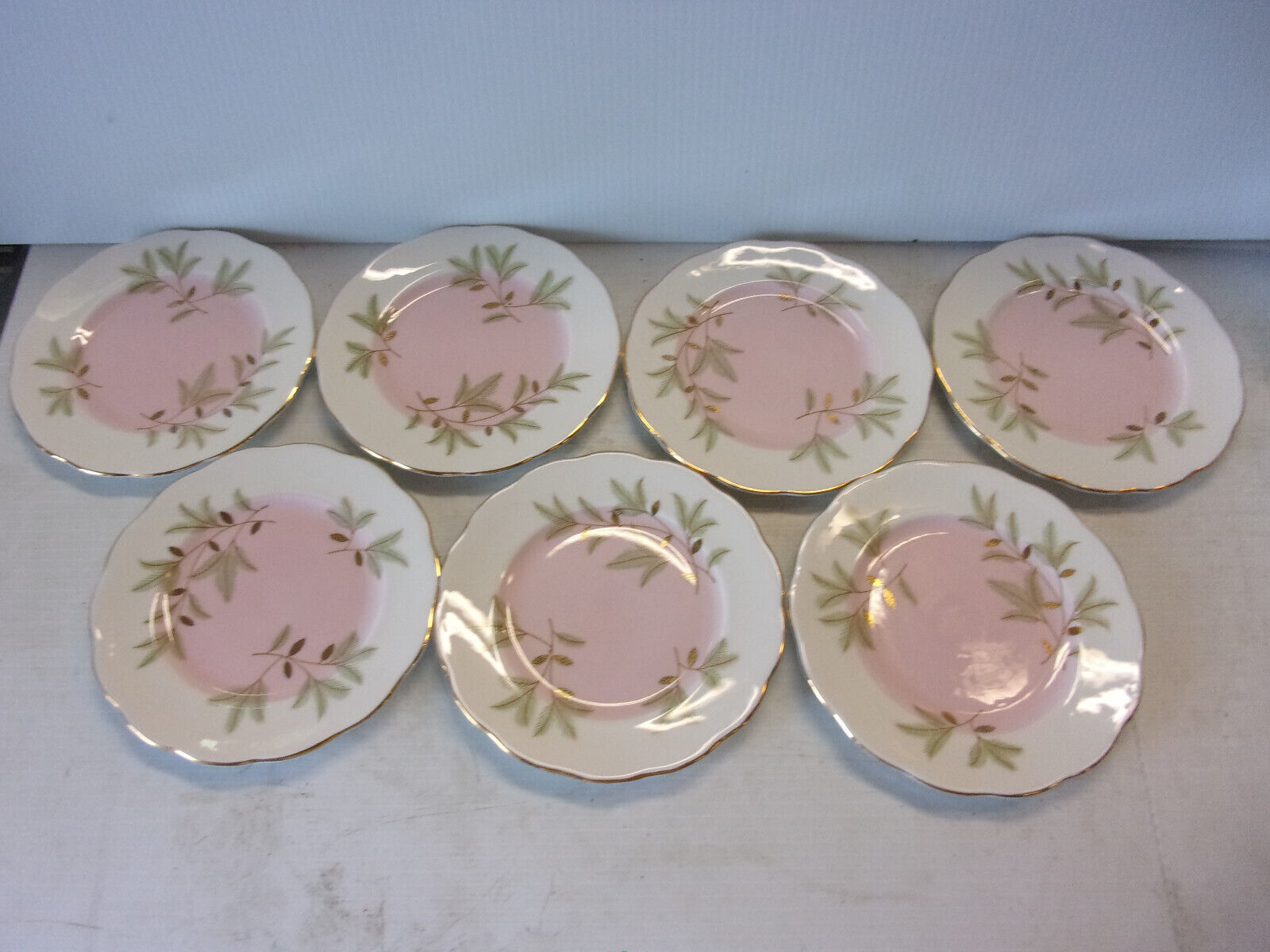 Primary image for "Royal Albert" Bone China "Braemar" 7 small plates, 6-3/8" conch pink with pine