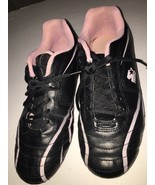 starter size 6 pink and black cleats - $225.80 MXN