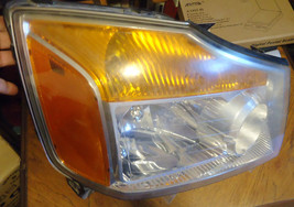 2008-2015 Nissan Titan    Headlight Assembly    Right Side - $138.11