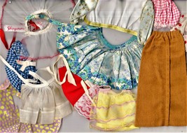 Large lot of 24 doll outfits. - £6.26 GBP