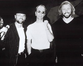 The Bee Gees Maurice Barry &amp; Robin smiling pose for press cameras 24x30 poster - $29.99