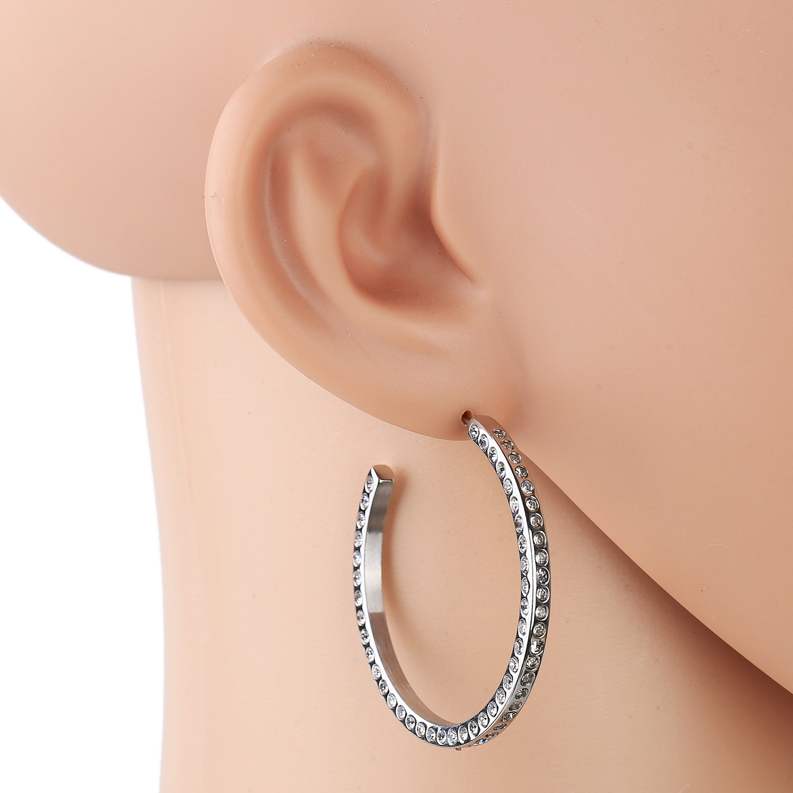 silver tone hoop earrings with dazzling swarovski style crystals