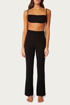 We Wore What smocked flare pants in Black - £51.50 GBP