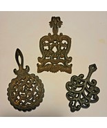 3 CAST IRON TRIVETS ONE IS A &quot;WILTON&quot; - $18.00