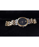 Movado Meuseum watch with a New Battery Swiss Made Gold Tone Bracelet - $204.35 CAD