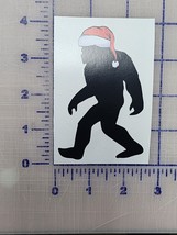 Bigfoot Santa Hat Xmas Sasquatch Bigfoot American Flag sticker 4&quot; Vinyl Decal - £2.93 GBP