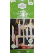Holiday Time 6-Count Battery Operated LED Hanging Candle Lights, with Timer - $12.86