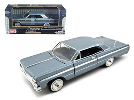 1964 Chevrolet Impala Blue 1/24 Diecast Model Car by Motormax - £32.68 GBP