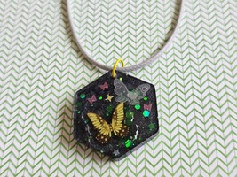 Butterfly Charm Bundle, including resin charm, necklace, mini flashlight... - $15.00