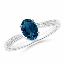 ANGARA 7x5mm Natural London Blue Topaz Solitaire Ring with Diamonds in Silver - £236.78 GBP+
