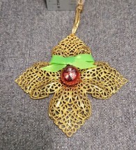 Filigree Metal Ornament Goldtone Red Bead Green Ribbon - $5.70