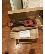 toy ukulele - $19.37 CAD