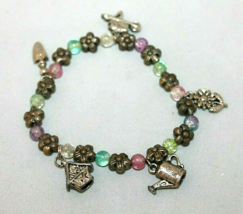Silver With Purple &amp; Green Charm Fashion Bracelet Stretchy Band Flower Watercan - £12.32 GBP