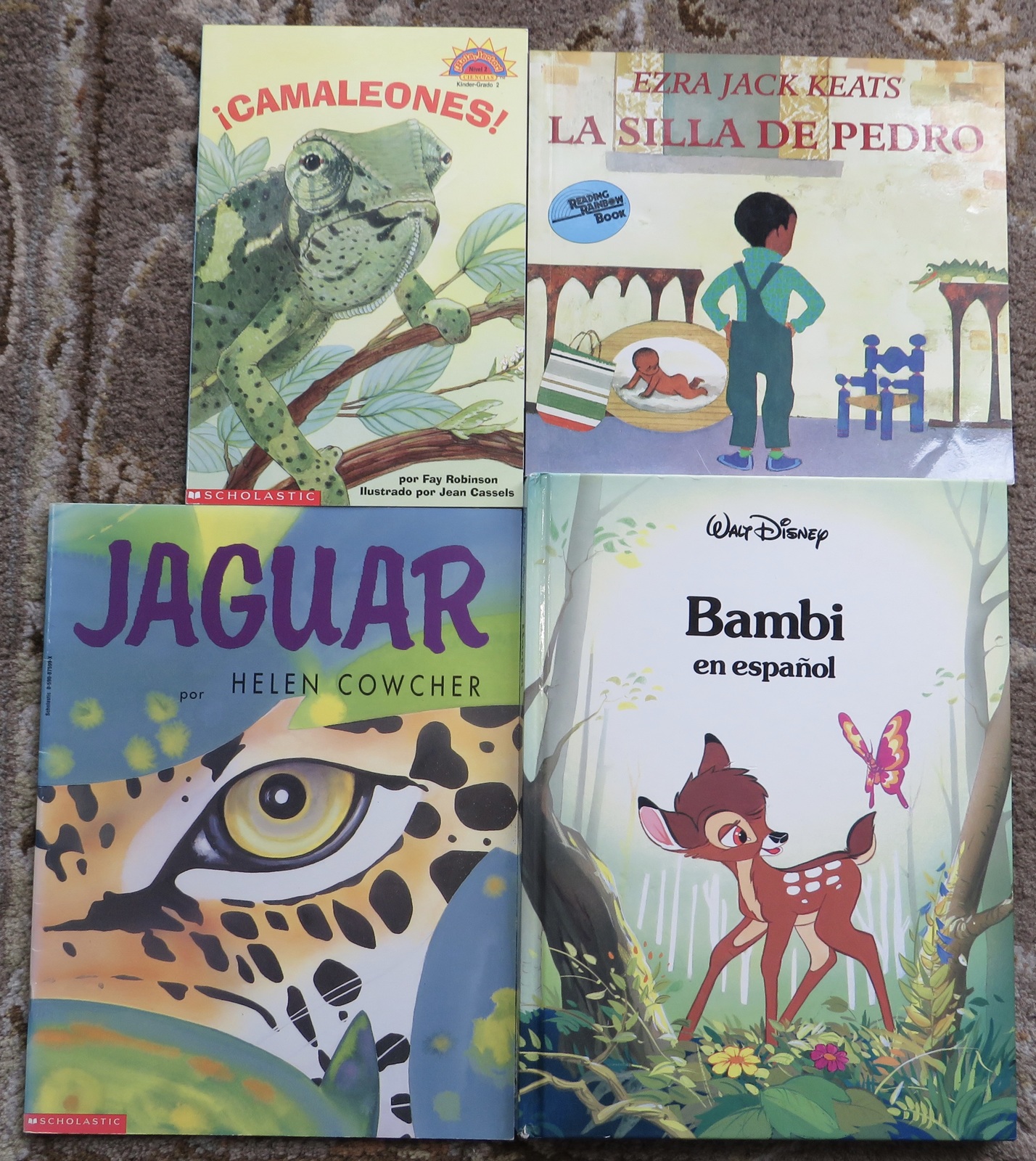 4 Spanish books La Silla De Pedro, Jaguar, Camaleones, Ezra Jack Keats, Bambi - $16.00