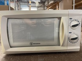 Westinghouse 0.6 Cubic Foot Microwave 6 Power Levels Grip Handle White - $75.99