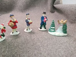 FOUR Ceramic Christmas Village Accessories, Different Holiday Figures - £6.83 GBP
