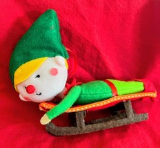 Holiday Plush Red &amp; Green Elf Ornament on a Plush Red &amp; Brown Sled 7&quot; Le... - $148.08 MXN