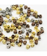 Tiny Heart Spacer Beads Assorted Lot Antiqued Bronze Gold Silver 4mm Fin... - $7.54 CAD