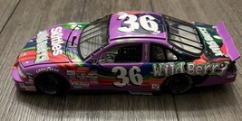 Ernie Irvan #36 Skittles Wild Berry 1998 Pontiac 1:24 Action Racing Bank - $19.30