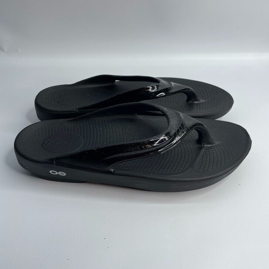 Primary image for OOfos OOlala Women's Recovery Sandal Size 10 US Luxe Thong Shiny Black Flip Flop