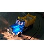  Light bulb for TYCO US1 Electric Trucking Blue &amp; Yellow Dump Truck - $110.74 MXN