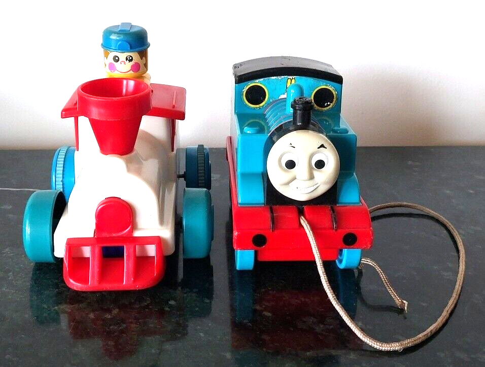 2 Vintage TOMY Trains - Push 'N Go 1997 and Thomas the Tank Engine Pull Toy 2006 - $11.87