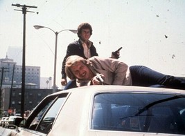 Starsky and Hutch Soul &amp; Glaser atop car holding guns 5x7 inch photo - $5.75