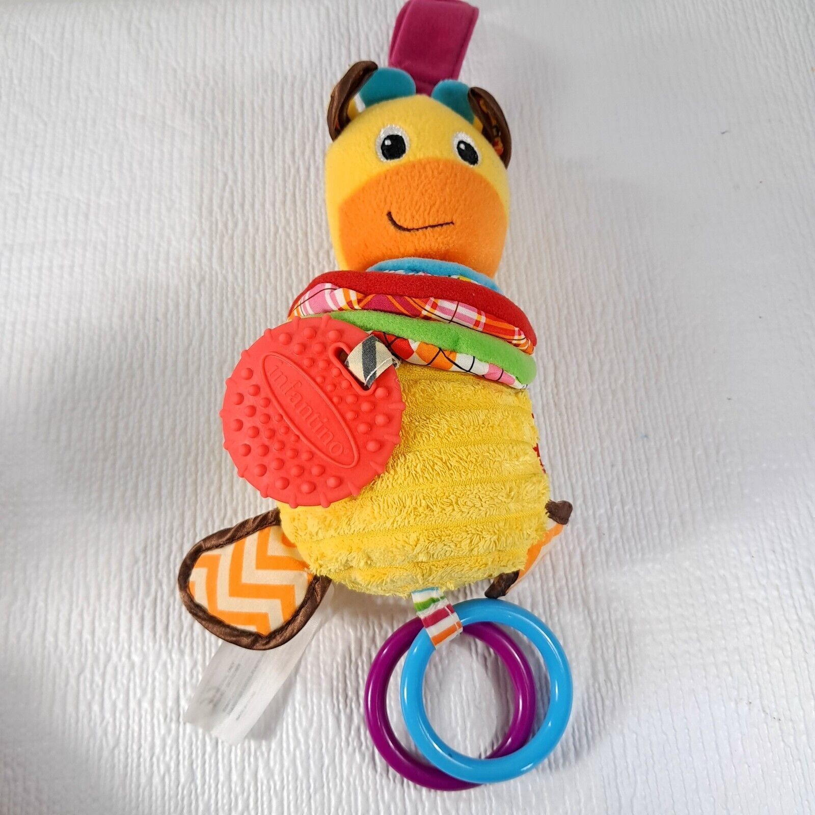 Infantino Hug and Tug Musical Giraffe Baby Plush Toy Crinkle lullaby mus... - $28.00