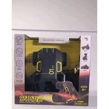 SHARPER IMAGE Stunt Strike Remote Control Stunt Car Spin Black Yellow Trim - $346.19 MXN
