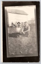 RPPC Young Couple in the Grass on the Farm Woman Man Postcard B30 - £7.04 GBP