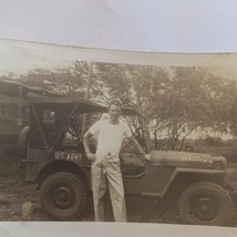 Found Black &amp; White Photo Youmg Military Man Posing in Front of Army Truck - £6.34 GBP