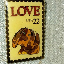 Highly collectible 22-cent stamp puppy lapel pin - £25.32 GBP