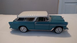 Turquoise Danbury Mint Car - $60.00