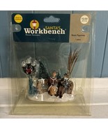 Santa’s Workbench O&#39;Well Christmas Village Woman Man Sitting On Park Bench - $24.43 CAD
