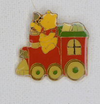 Disney classic Winnie the Pooh On Christmas Train Ringing A Bell Pin#6639 - £13.61 GBP