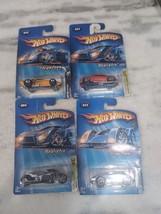 Hot Wheels 2005 First Edition Bundle: 2 Realistix, Torpedoes &amp; Drop Top ... - £12.44 GBP