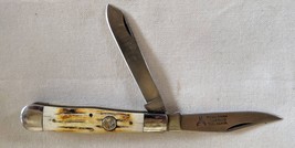 An item in the Antiques category: Vintage White Tail pocket knife 2 blade. like new Bone handle