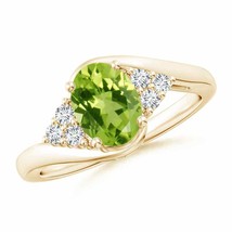 ANGARA Oval Peridot Bypass Ring with Trio Diamond Accents for Women in 14K Gold - £940.61 GBP