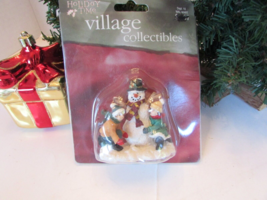 Holiday Time Walmart Village Figurine Building a Snowman L135 - $7.55