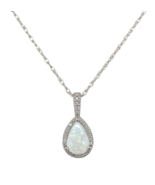 Platinum .54ct Australian Genuine Natural Opal and Diamond Halo Pendant ... - $1,515.80 CAD Platinum .54ct Australian Genuine Natural Opal and Diamond Halo Pendant ... - $1,515.80 CAD