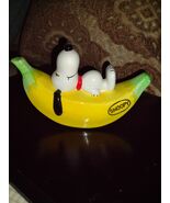 Vintage Japan Peanuts Gang SNOOPY ON A BANANA Ceramic Coin Bank - $28.45