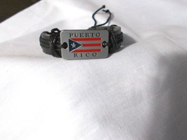 BLACK LEATHER PUERTO RICO METAL FLAG w TEXT SOLID BLACK CORD ADJ BRACELET - $91.86 MXN